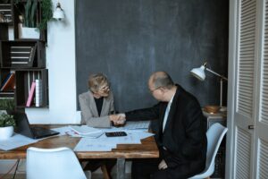 Hiring manager shaking hands with candidate